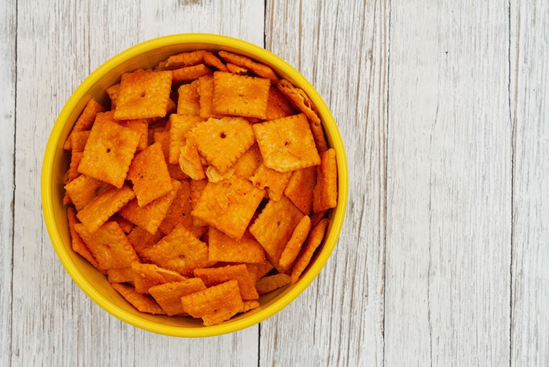 Can dogs eat crackers and cheese?