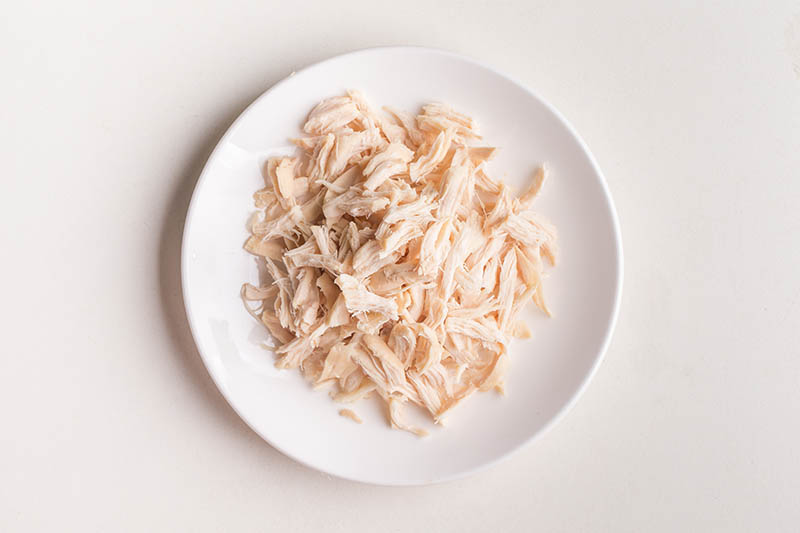 shredded boiled chicken on the plate