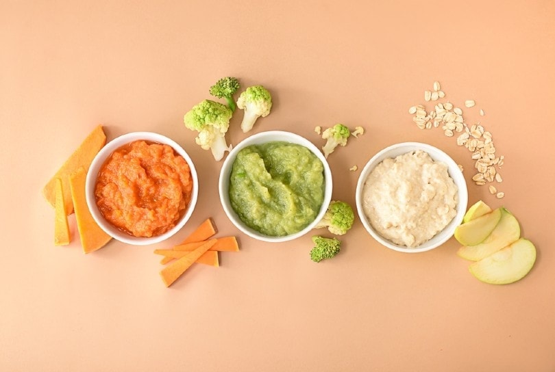 Bowls with healthy baby food