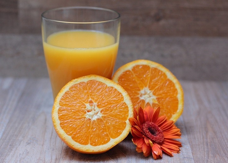 is orange juice good for dogs