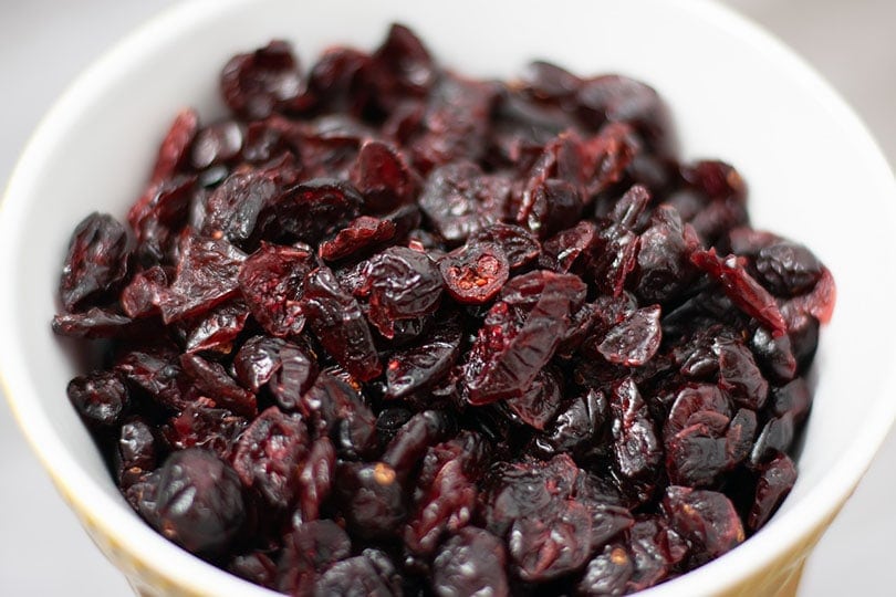 a bowl of dried cranberries or craisins