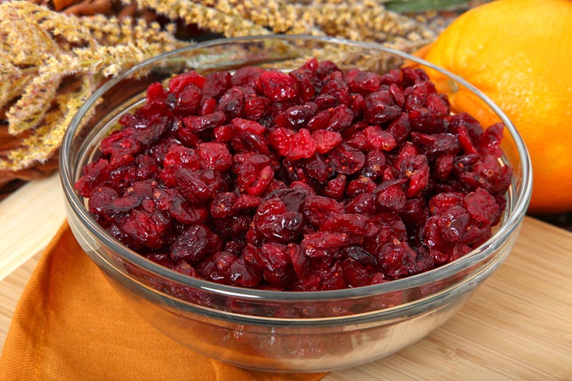 glass bowl of dried cranberries or craisins in kitchen