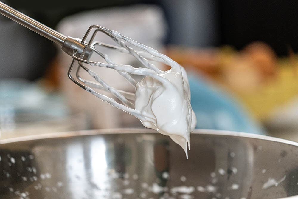 whipped cream on whisk