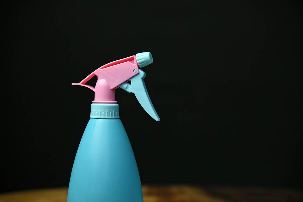 blue and pink spray bottle
