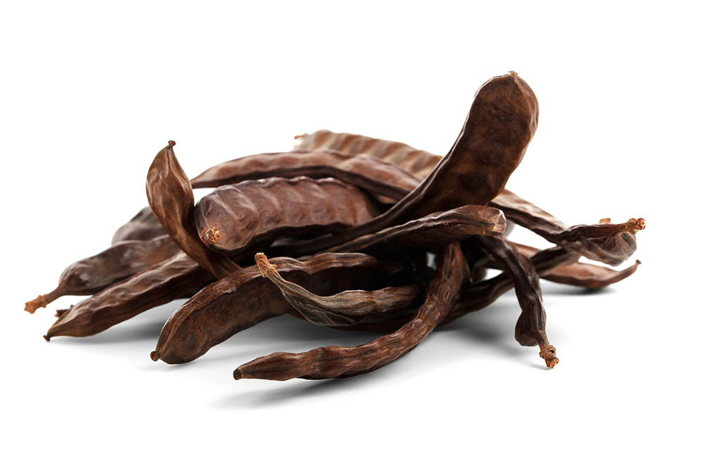carob in white background