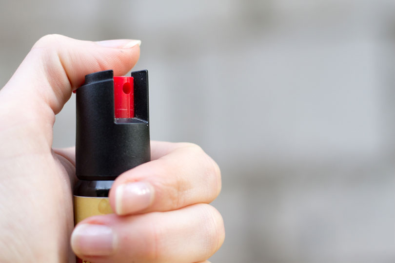 close up of a gas pepper spray in hand