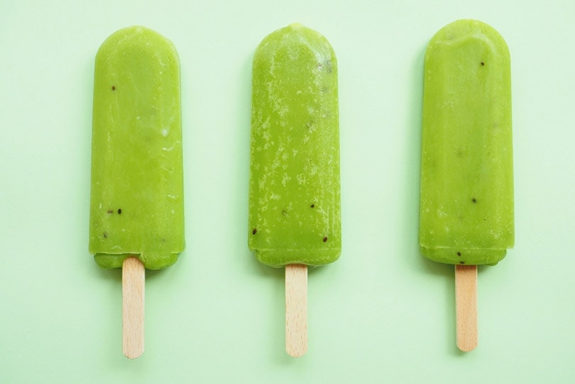 three cucumber popsicles
