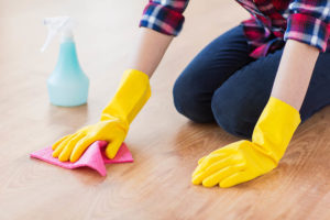 person cleaning floor