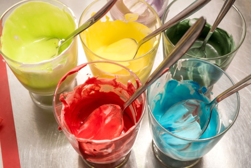 different food coloring in glass