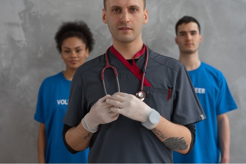 veterinarian and two volunteer