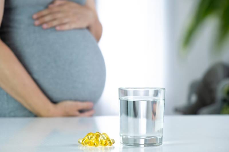 prenatal vitamins and supplements on table