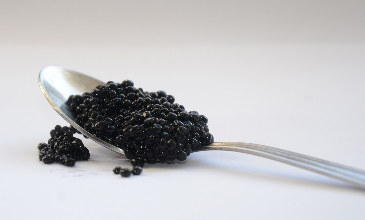 black caviar in a spoon