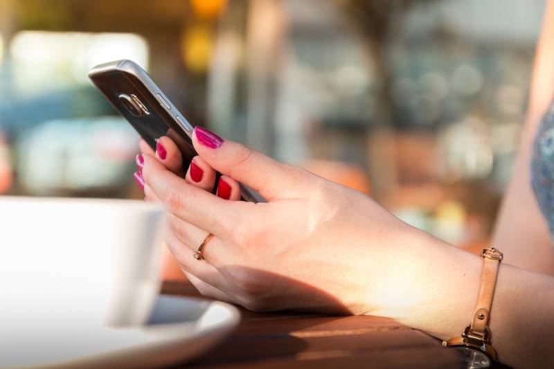 woman using her phone