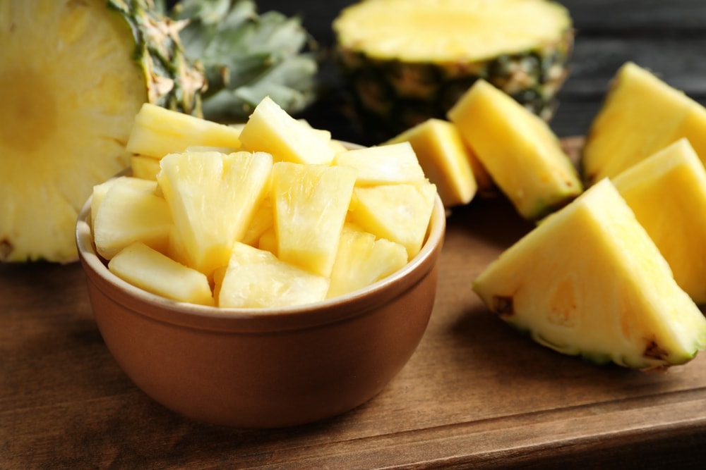 bowl with fresh sliced pineapple