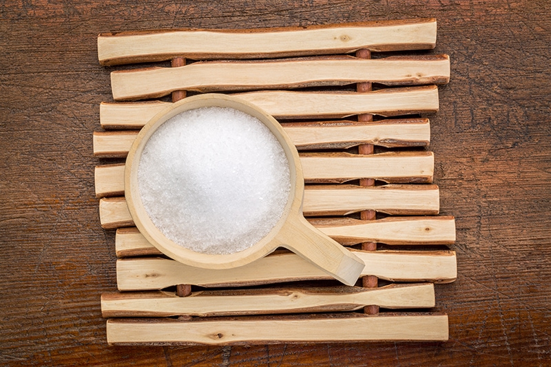 epsom salt in a wooden scoop