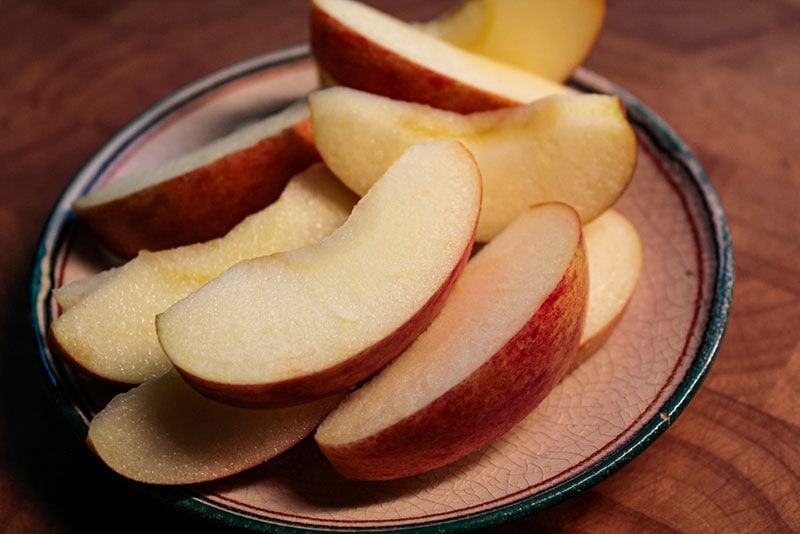 a small plate of sliced apples