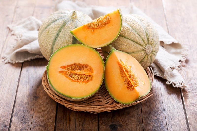 cantaloupe on wooden table