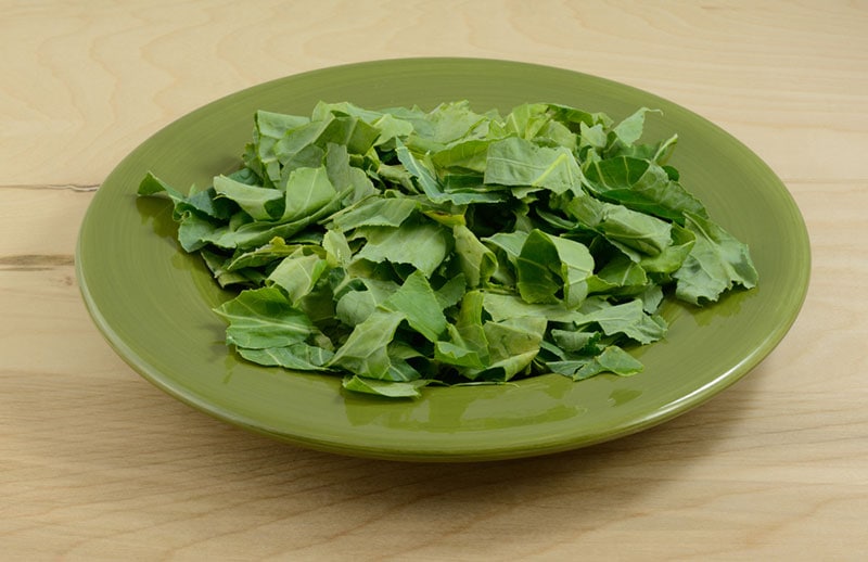 chopped collard greens on a plate