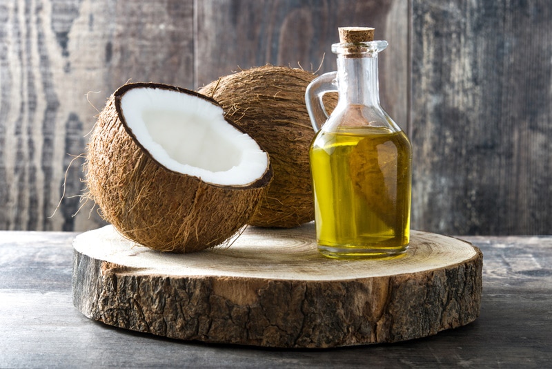 coconut oil on wooden board