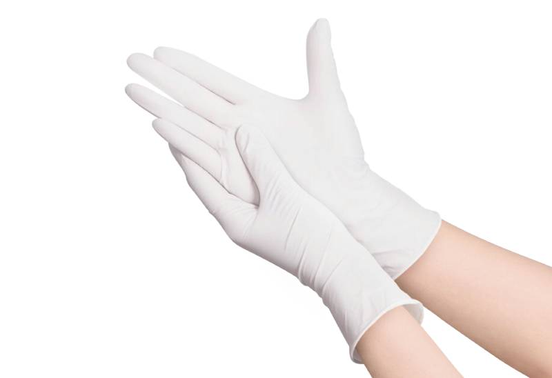 two surgical medical gloves isolated on white background with hands