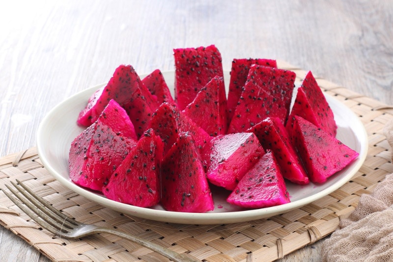 dragon fruit slices on a plate