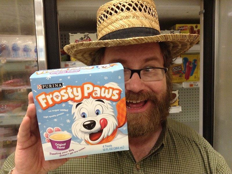 Man holding a box of Frosty Paws