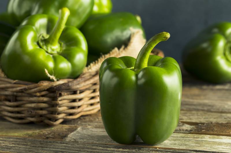 Raw Green Organic Bell Peppers Ready to Cook