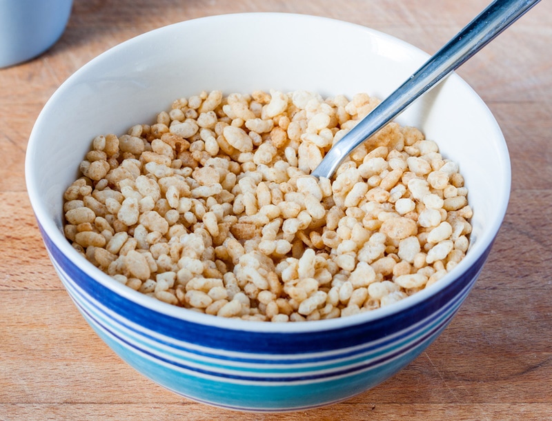 rice krispies in blue striped bowl