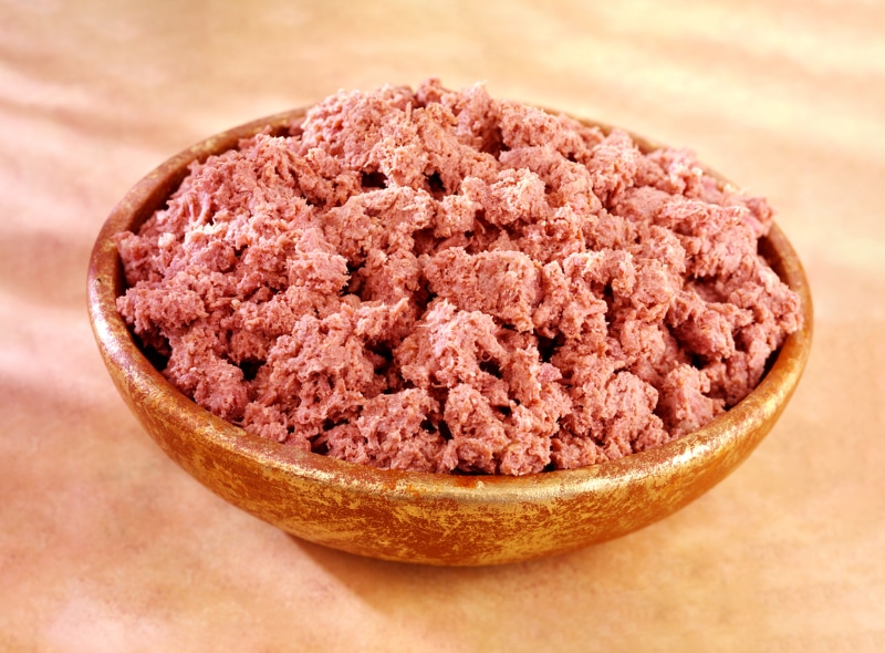 corned beef in wooden bowl