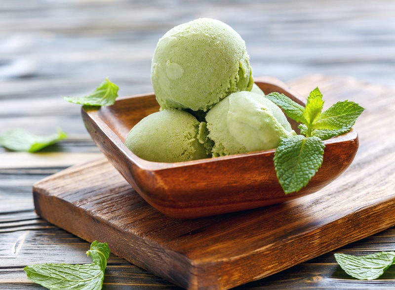 mint ice cream in wooden bowl