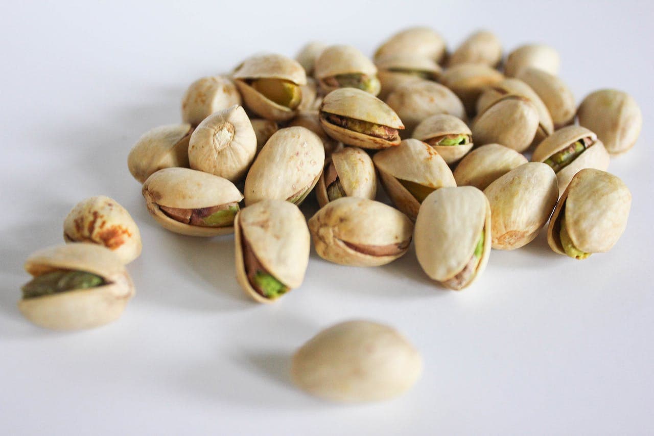 Close Up Photo of Bunch of Pistachios