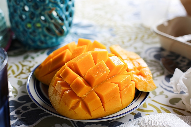sliced mango on a plate