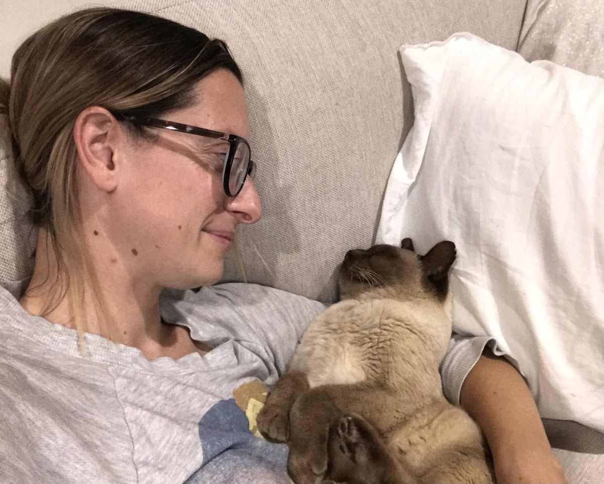 Stuck here for hours, how could you move with a snuggly little nugget like that.